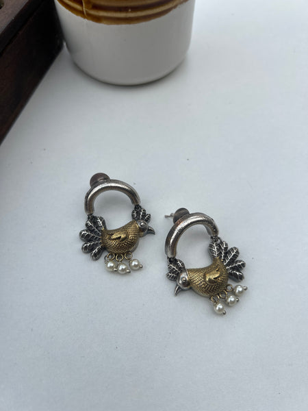 Dual tone bird studs