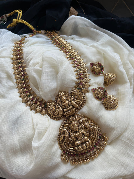 Nagas Lakshmi coin haram with oversized pendant and jhumkas