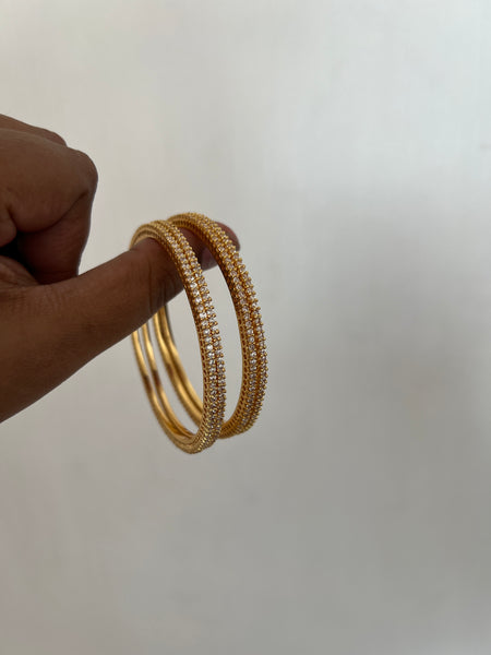 Tiny stone gold look alike bangles set of 4