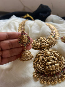 Nagas Lakshmi coin haram with oversized pendant and jhumkas