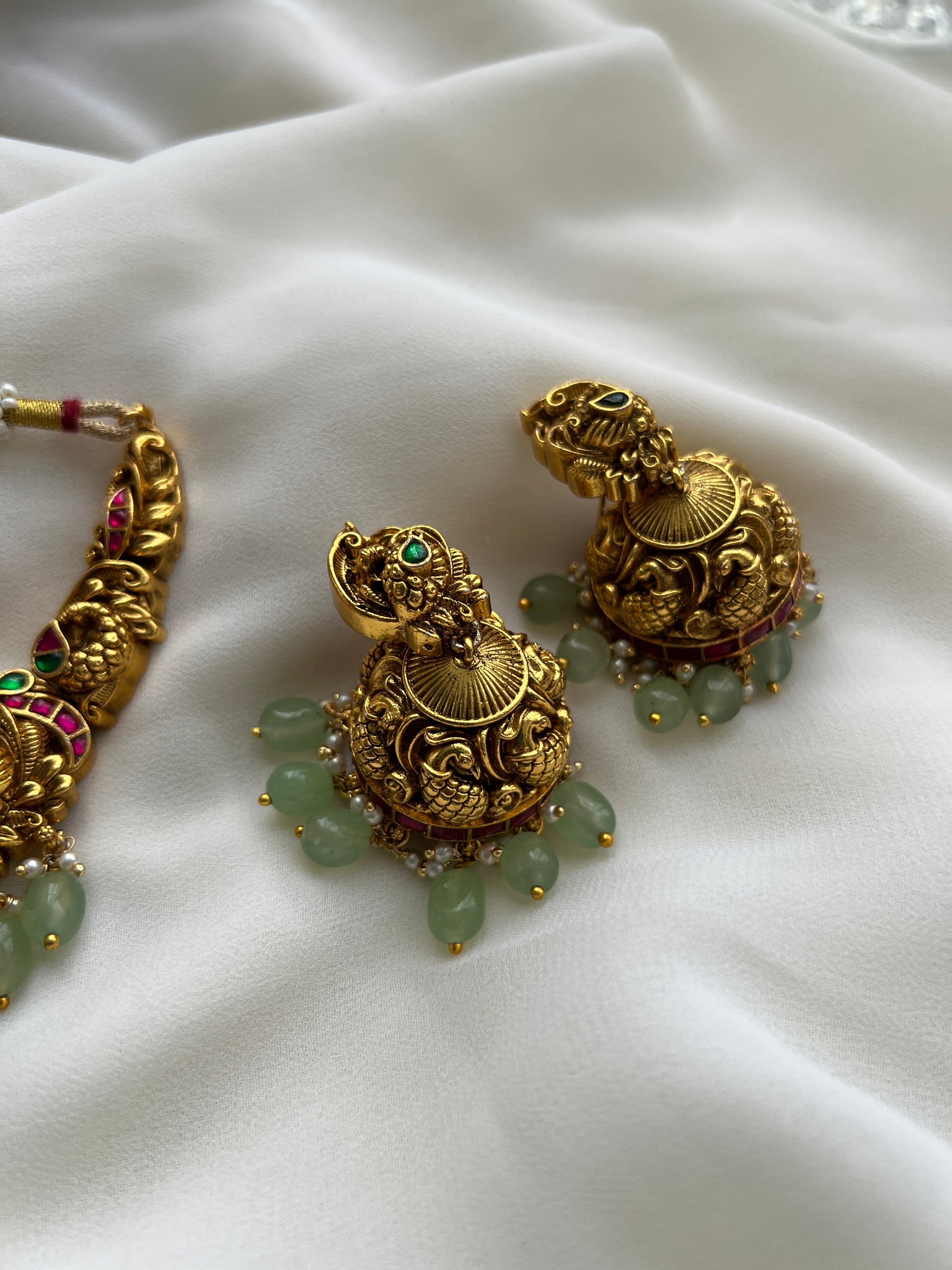 Kundan Nagas necklace with mint beads and jhumkas