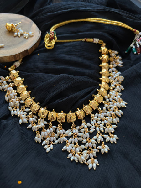 Golden matte rice pearl necklace with studs