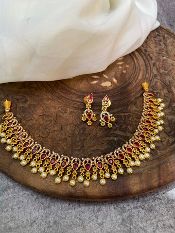 Ruby tear drop Ad necklace with studs