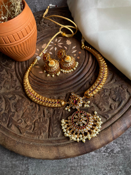 Kemp pendant with hasli necklace and Jhumkas